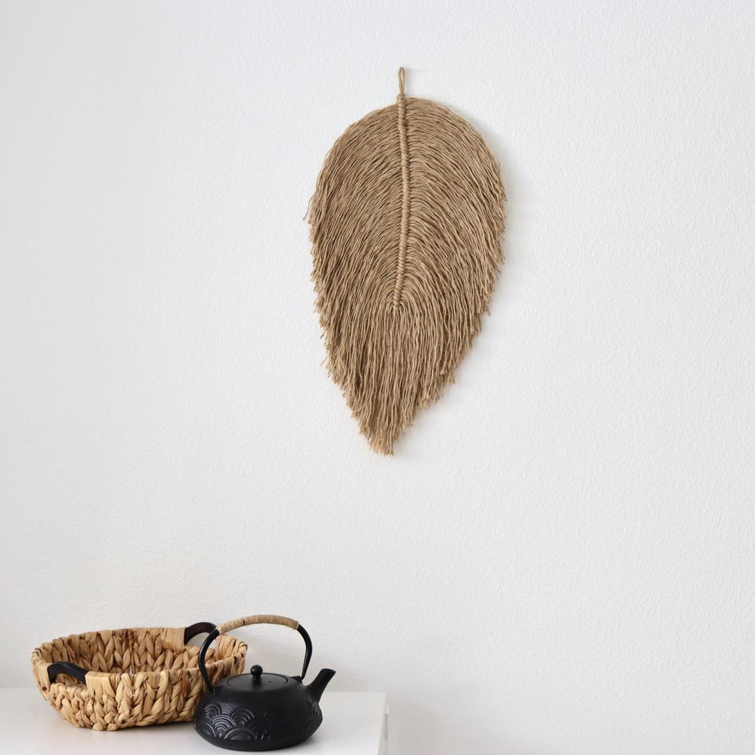 Afgewerkt jute blad decoratie