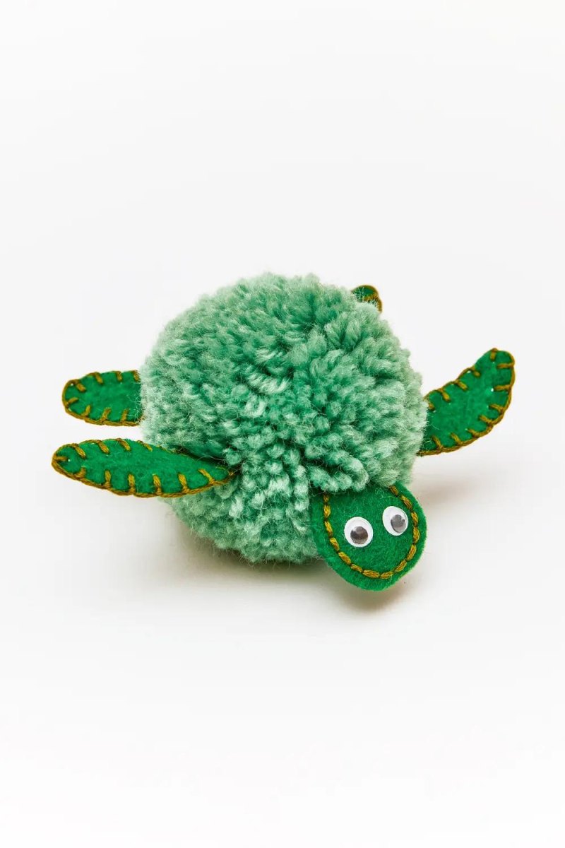 Ogen toevoegen aan pom pom schildpad