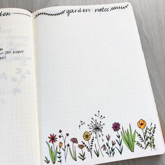 Kleine veldbloemen getekend in journal