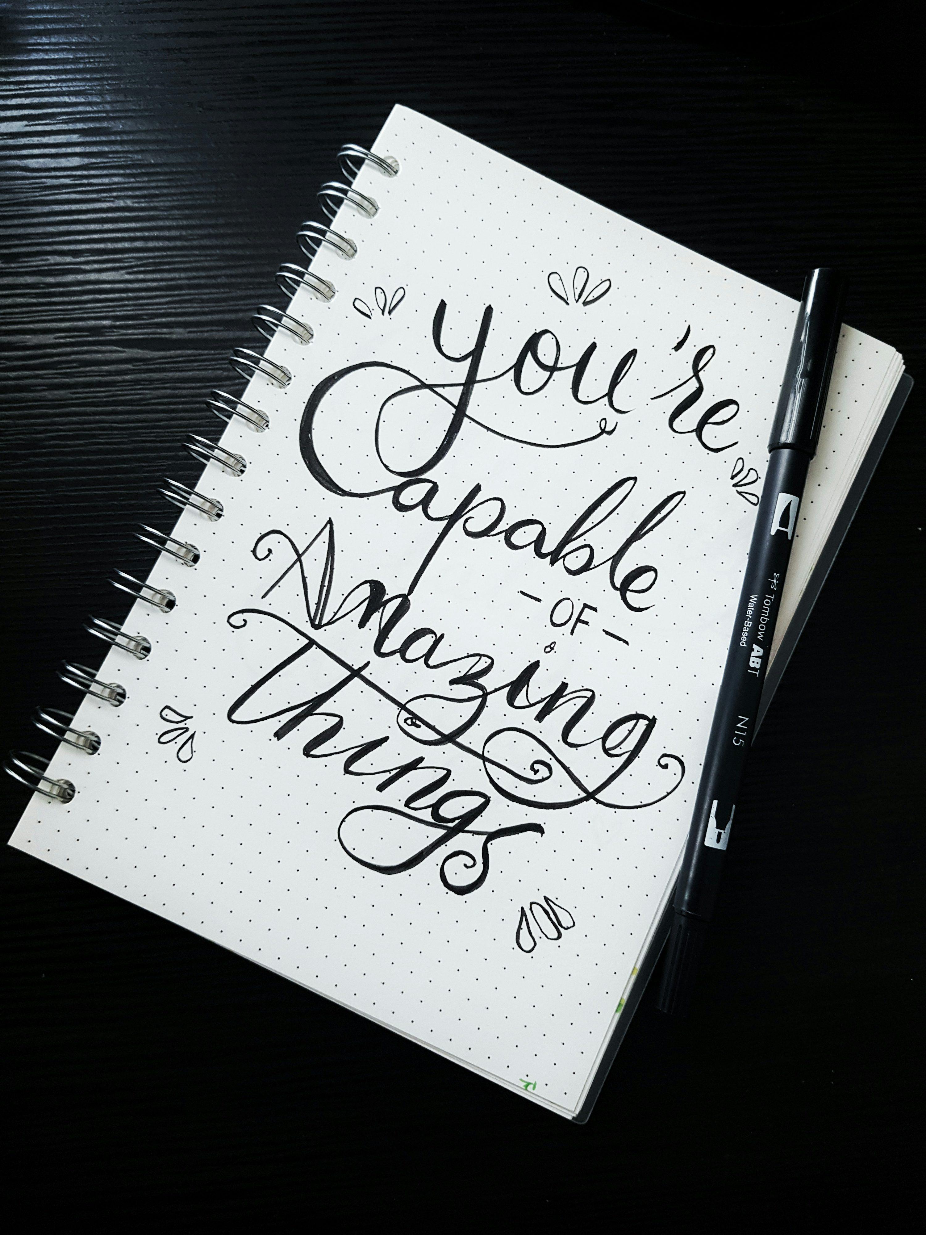 Handlettering quote op papier