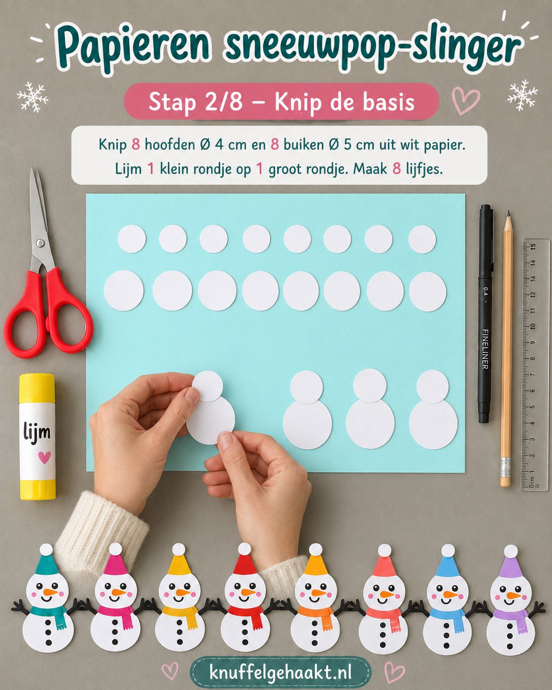 Handen knippen witte cirkels voor hoofd en buik tijdens het papieren sneeuwpop met muts knutselen